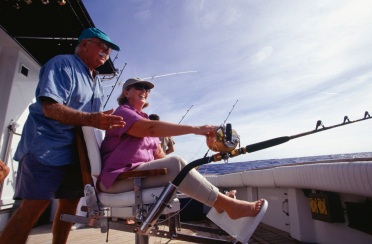 Couple on a boat enjoying Cape May fishing